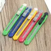 Small wallpaper knife with replaceable blades, small knife with plastic handle, unboxing and paper cutting knife, office desk stationery and art knife Application Scenario
